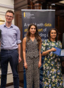 A photo of the winning team with their award.