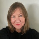 Dr Sarah Walsh smiling,